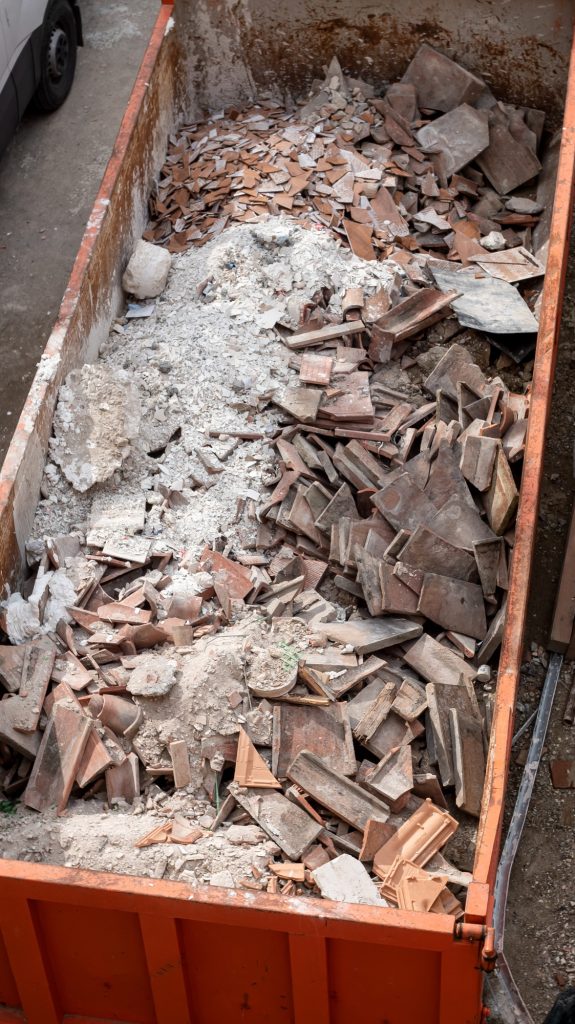 Building rubble and debris ready to be disposed of and recycled.